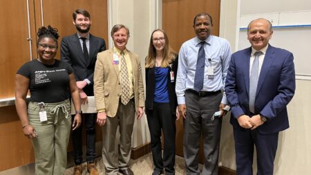 Photo of our winning trainees along with Dr. Christopher Moskaluk (Chair of Pathology), Dr. Anne Mills, the Keynote Speaker Dr. George Netto and Luke  Vass (second from the left, with the beard)